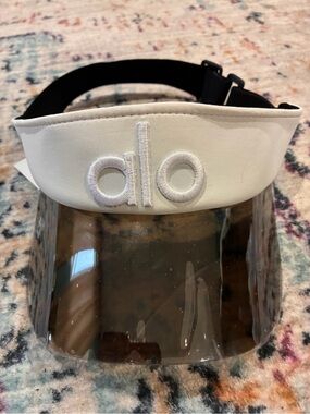 ALO Airlift White Visor with protective coating on the shield still